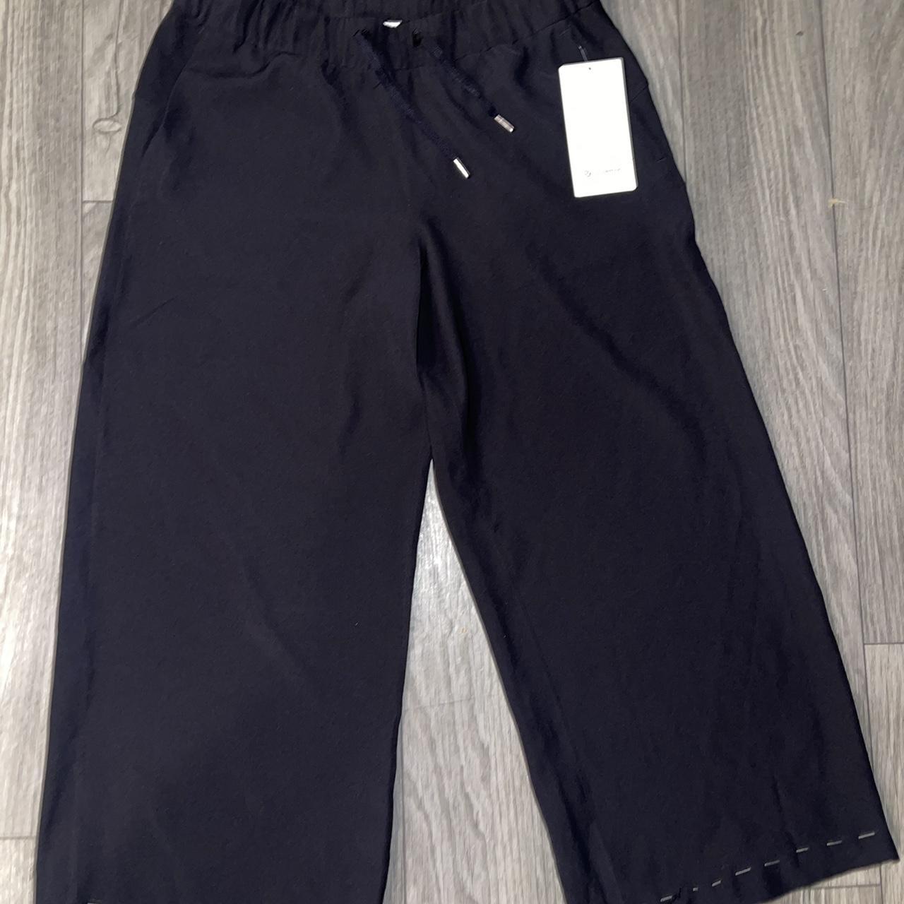 Lululemon old school wide-leg pants. Material is - Depop