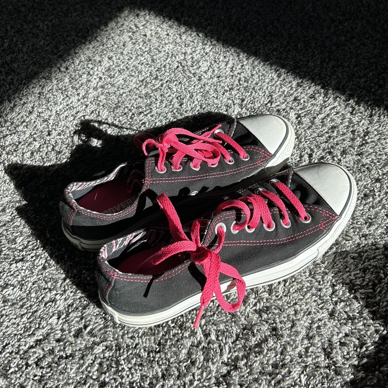 Black converse shop with pink trim