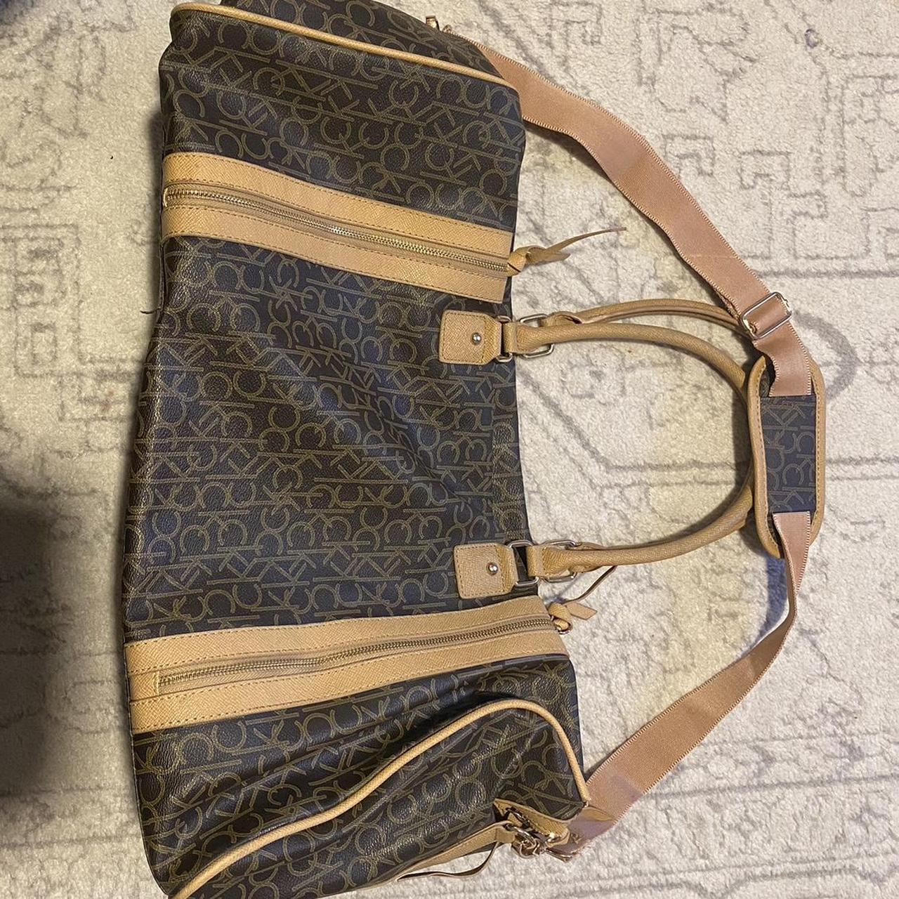 Calvin klein monogram hot sale duffle bag