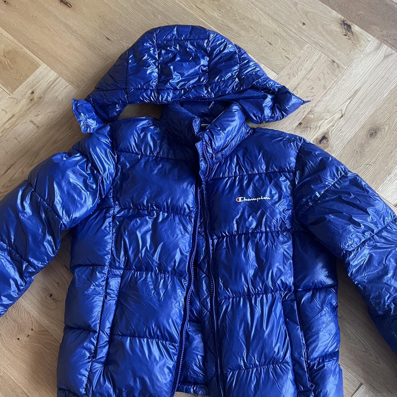 Blue Champion puffer jacket. worn once. Adjustable hood