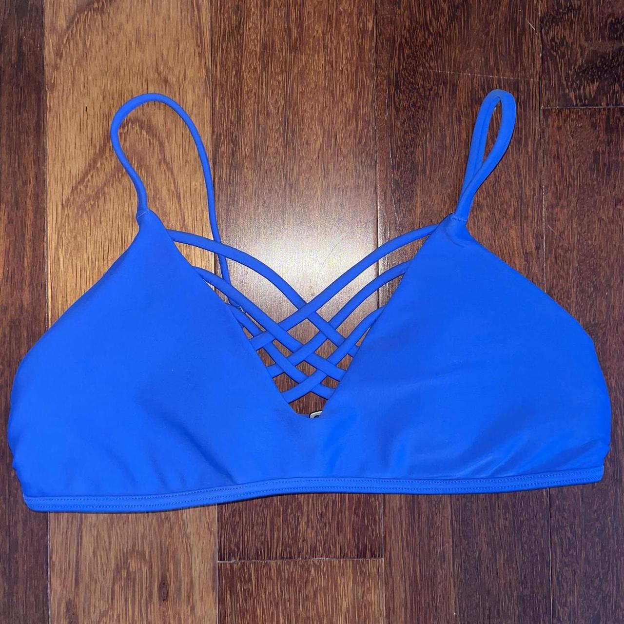 Blue Hollister bikini top. Small snag on the left side - Depop