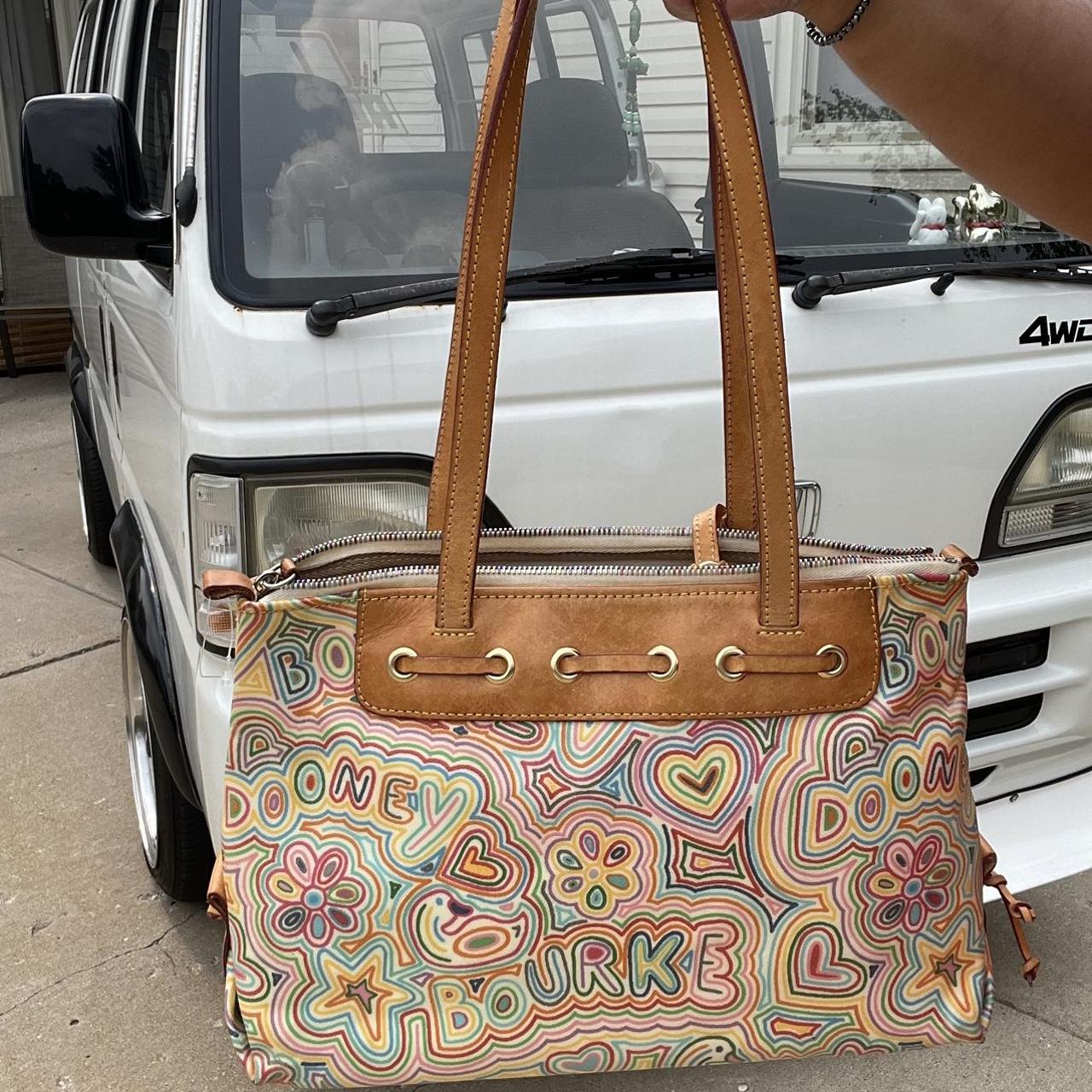 Used dooney best sale and bourke purses