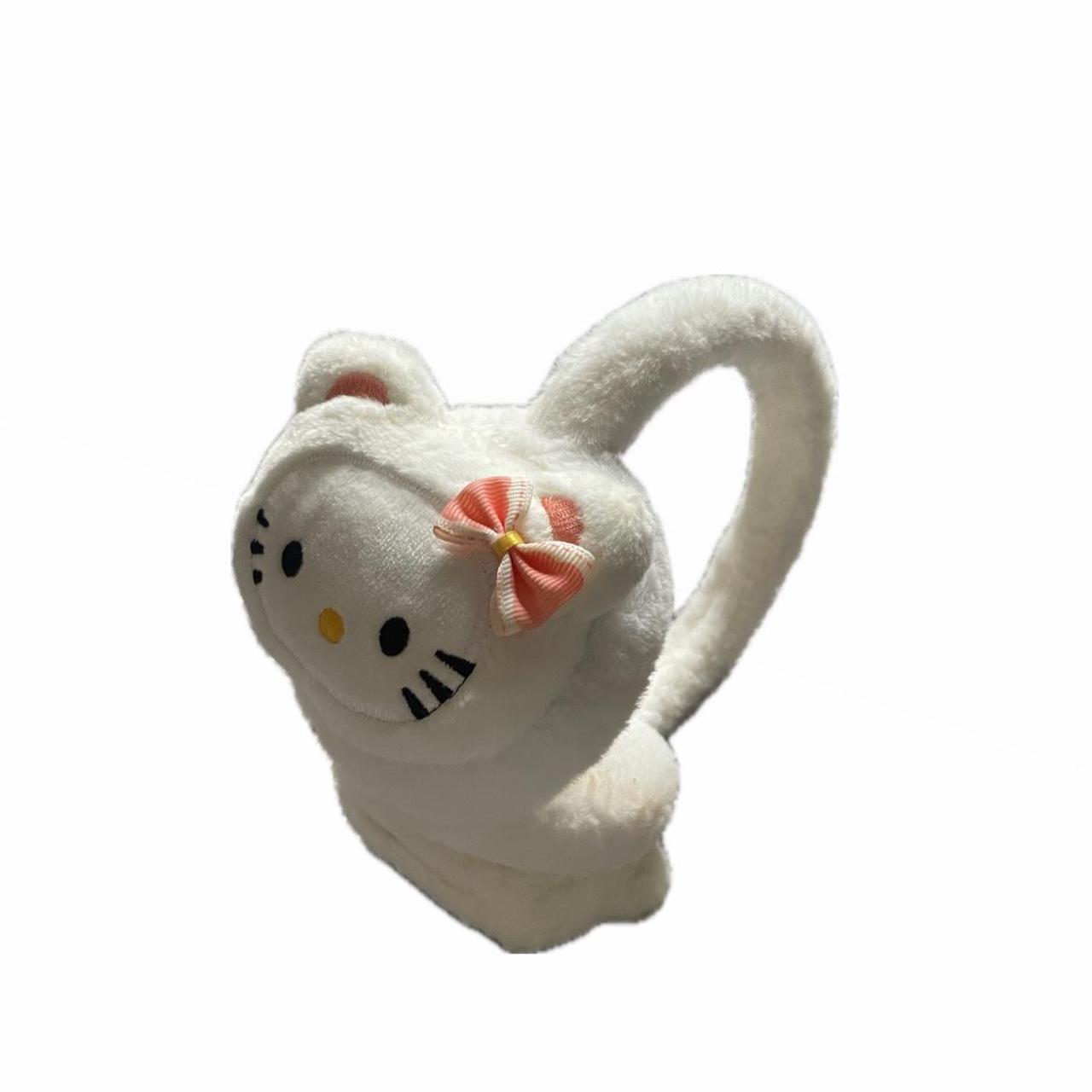 Hello Kitty Ear Muffs One sized Roughly worn... - Depop
