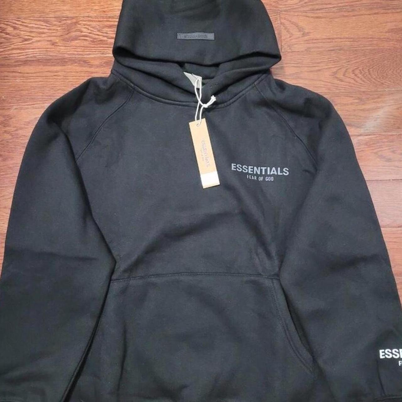 black essentials hoodie fits S-M prices are... - Depop