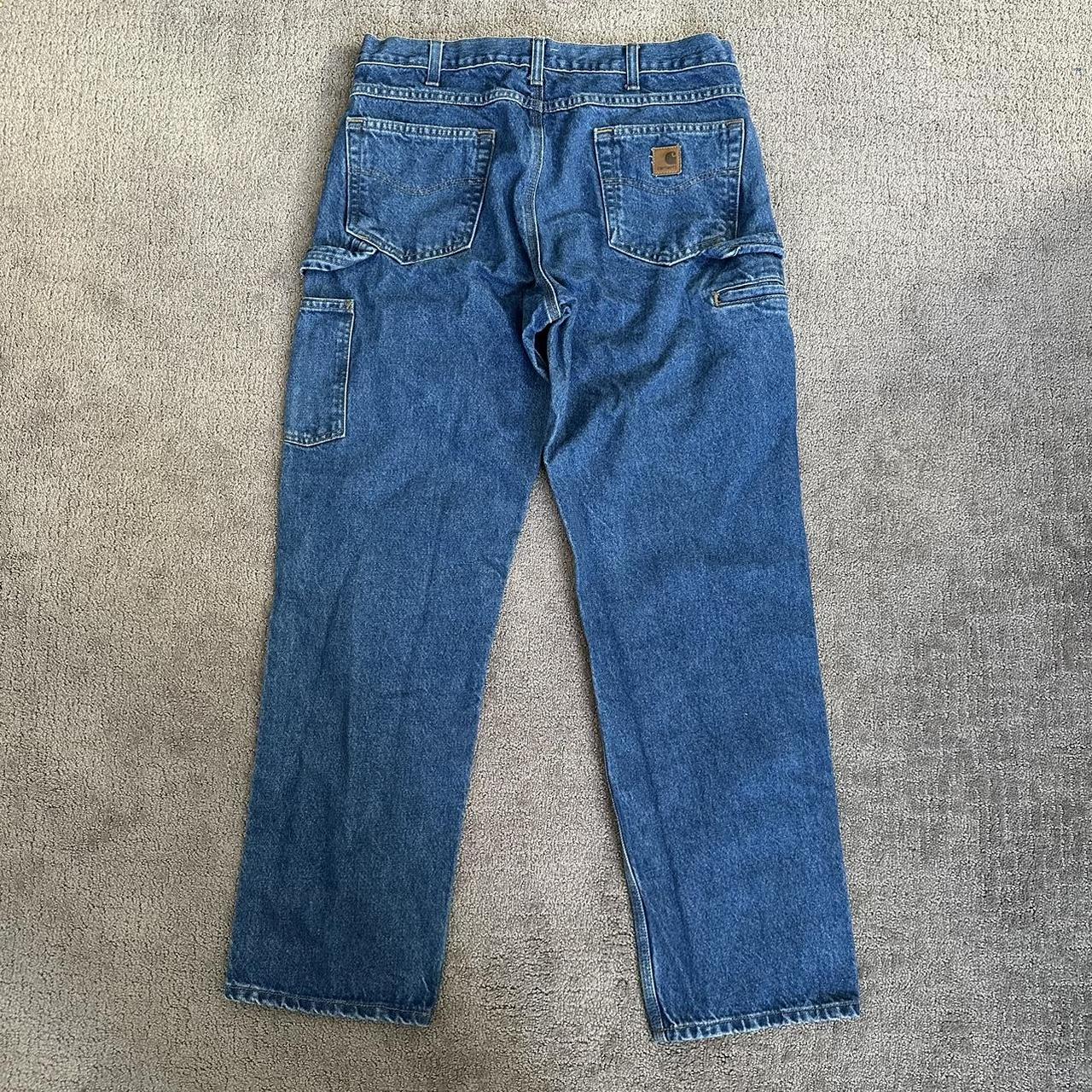 Vintage Carhartt baggy medium wash carpenter jeans.... - Depop