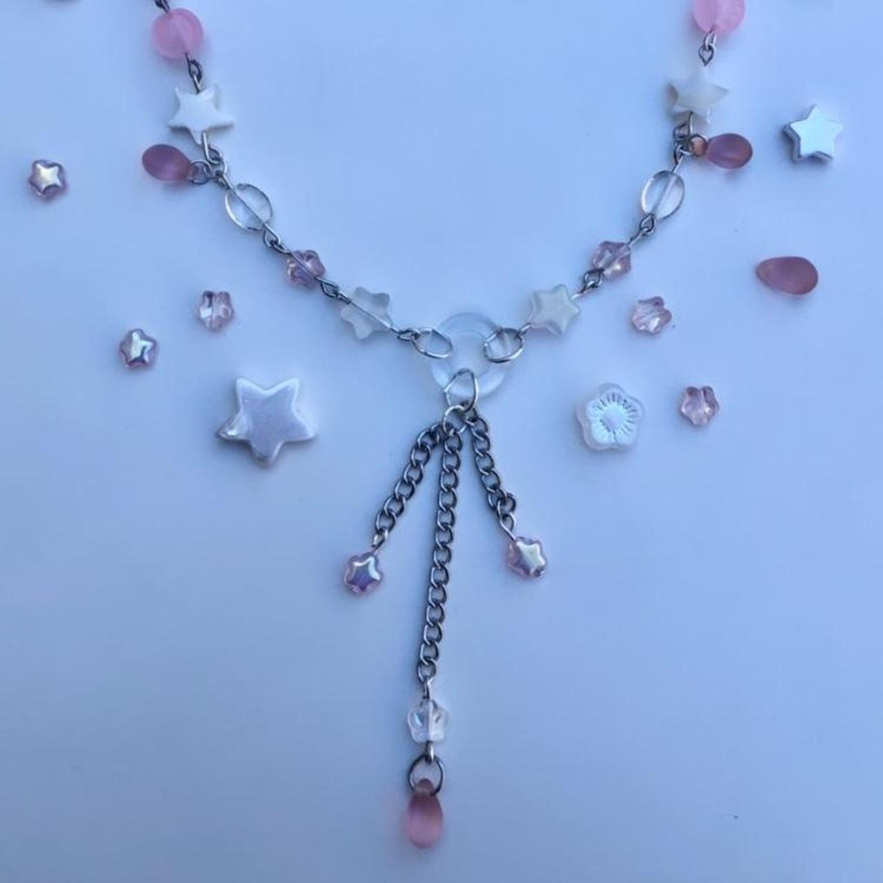 pink glass star and drop clear donut bead, dangle... Depop