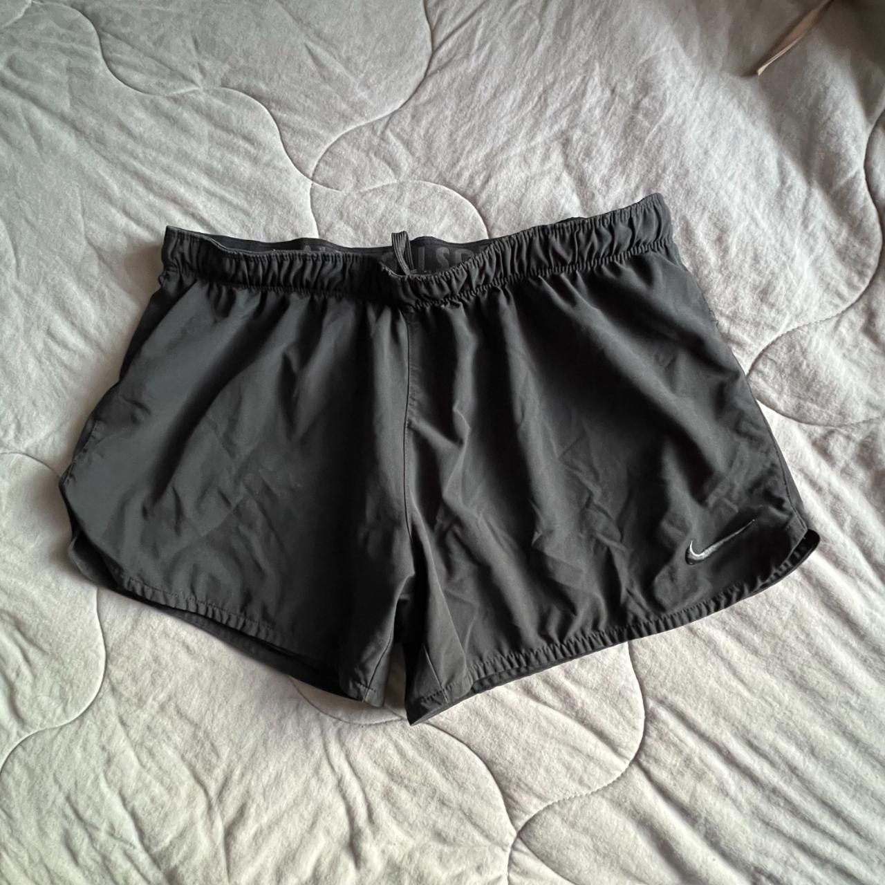 Black Nike running shorts with built in spandex Depop