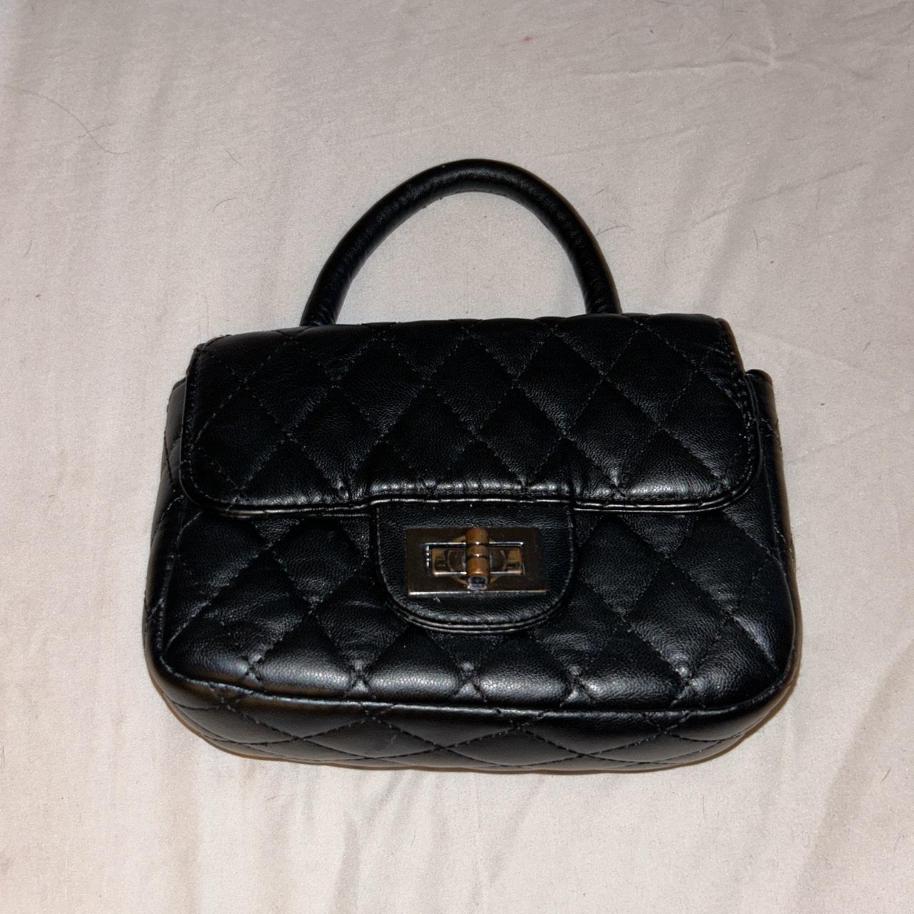 Black mini Padded Bag. Good condition! Minor wear - Depop