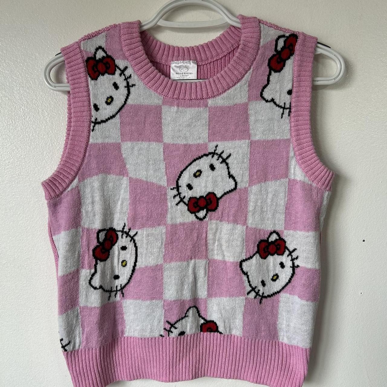 Hello kitty sweater vest Fits kind of boxy... Depop