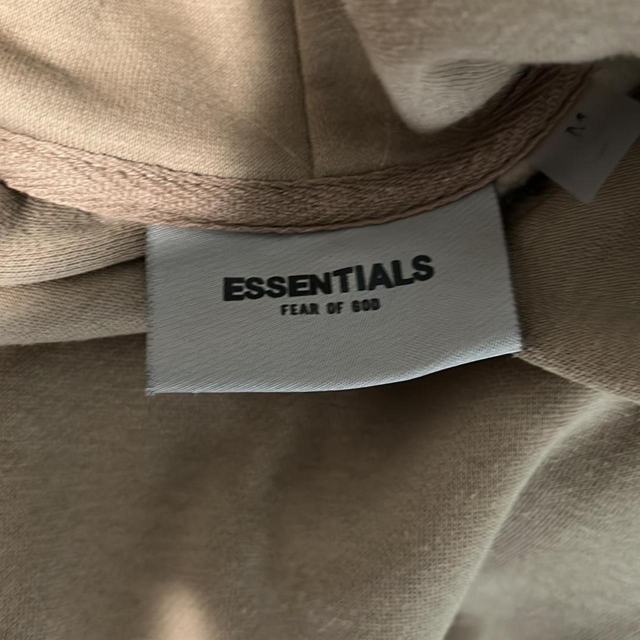 tan essentials hoodie - Depop