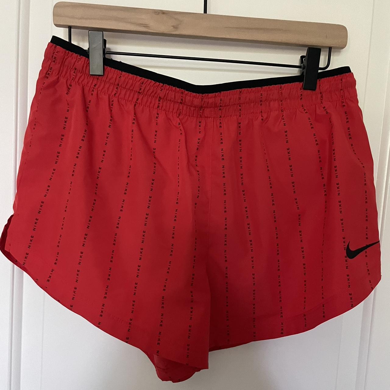 Red Nike athletic shorts, worn once - Depop