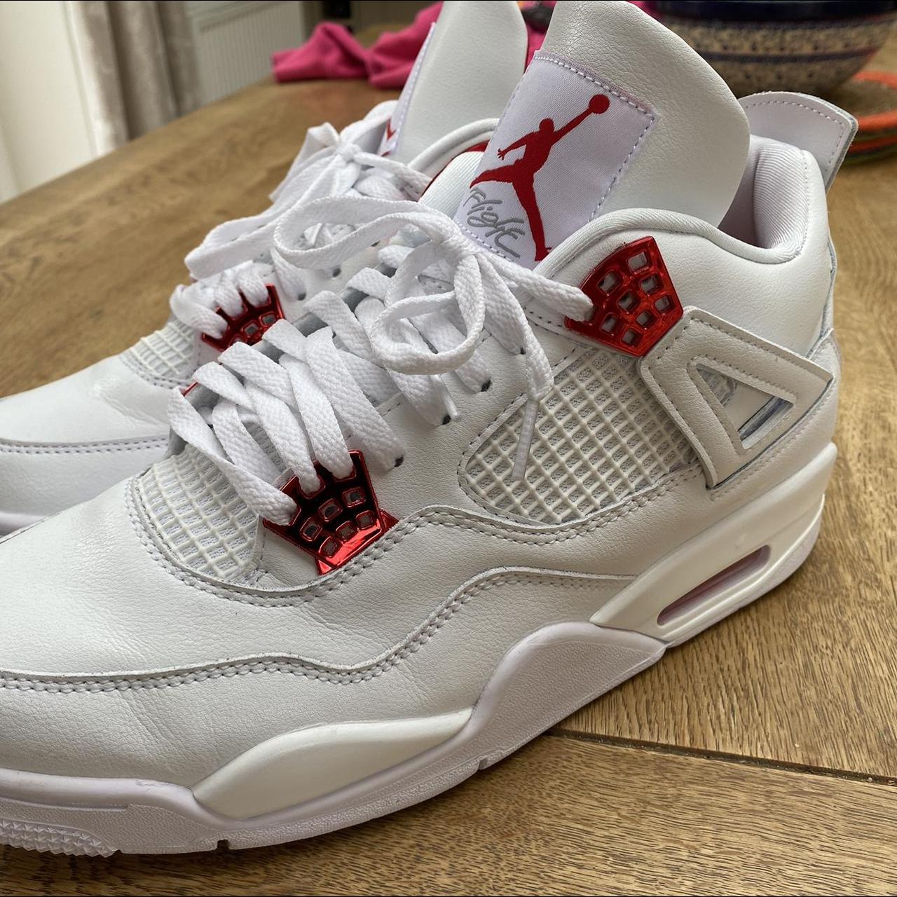 metallic red jordan 4