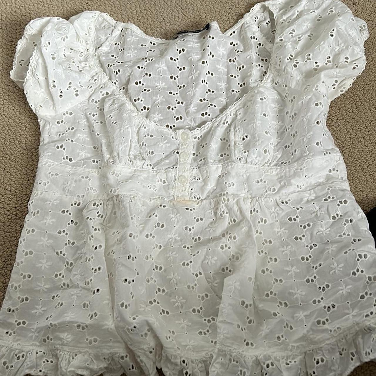 Brandy Melville floral top, Small makeup stain that... - Depop