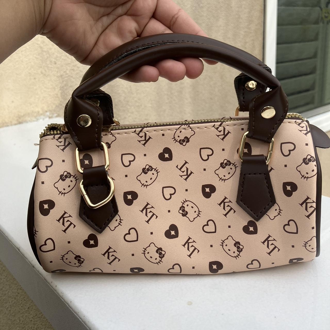 Hello kitty coach online purse