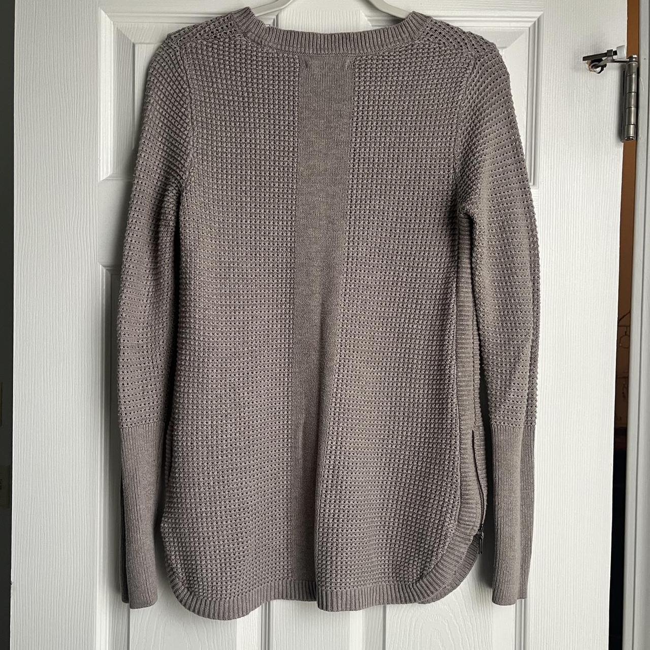 Akini knit sweater Zippered slits on each. Depop