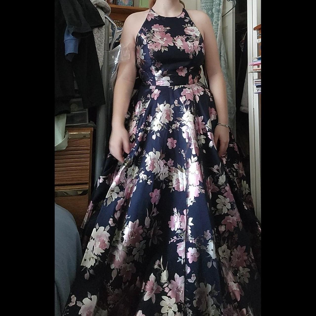 Floor length navy floral gown. Brand new with tags