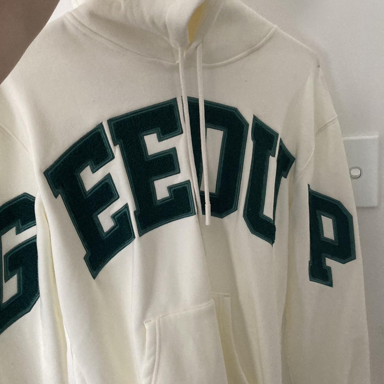 💚🤍 Green and white geedup hoodie Worn once, flaws... - Depop