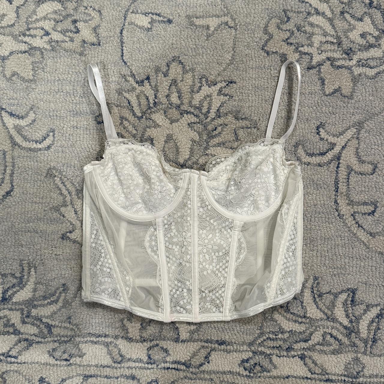 White Fox corset top, a little bit of pink on the... - Depop