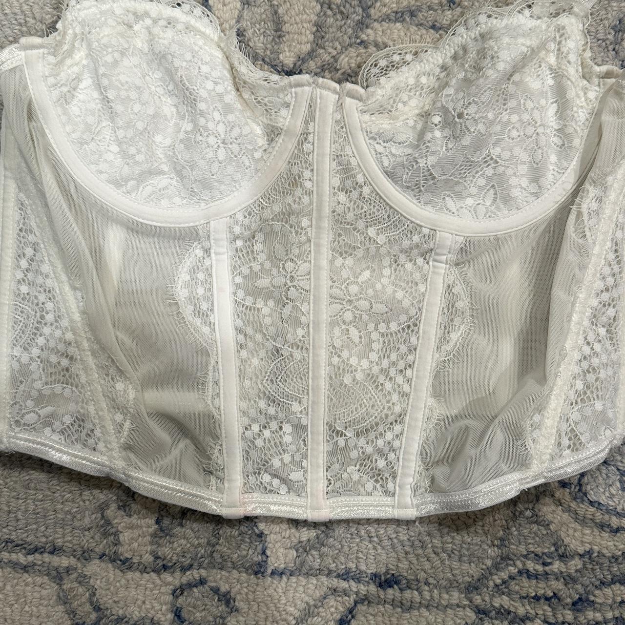 White Fox corset top, a little bit of pink on the... - Depop