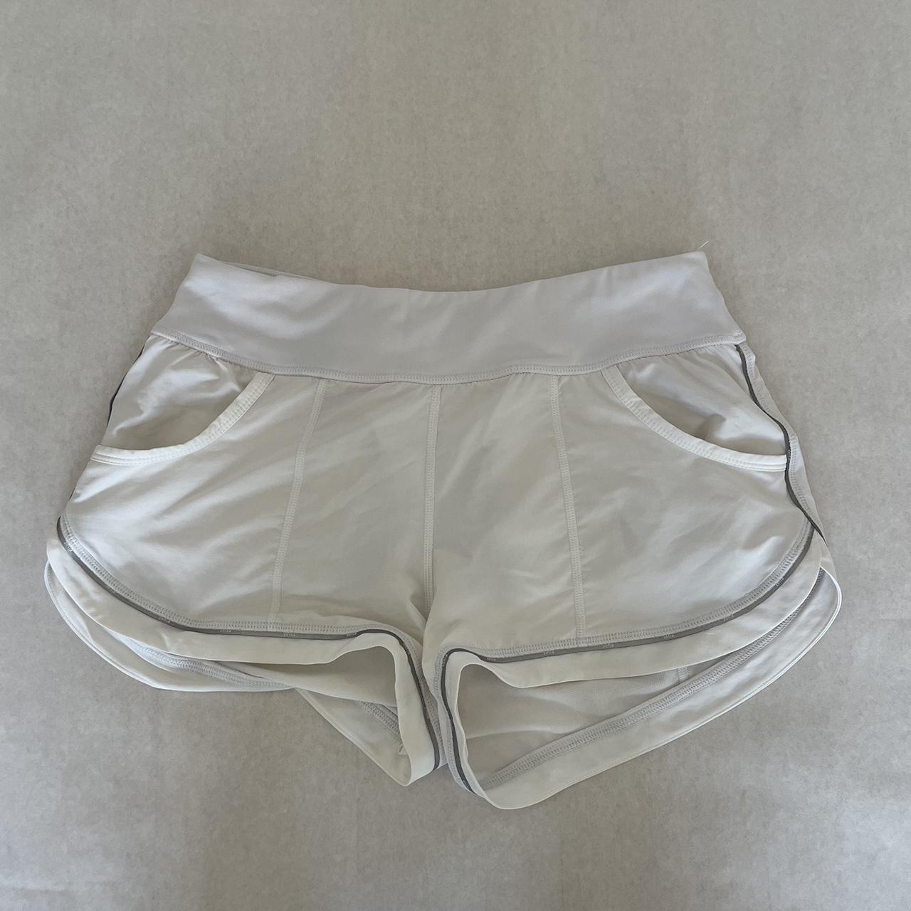 white zella workout shorts with pockets & internal... - Depop