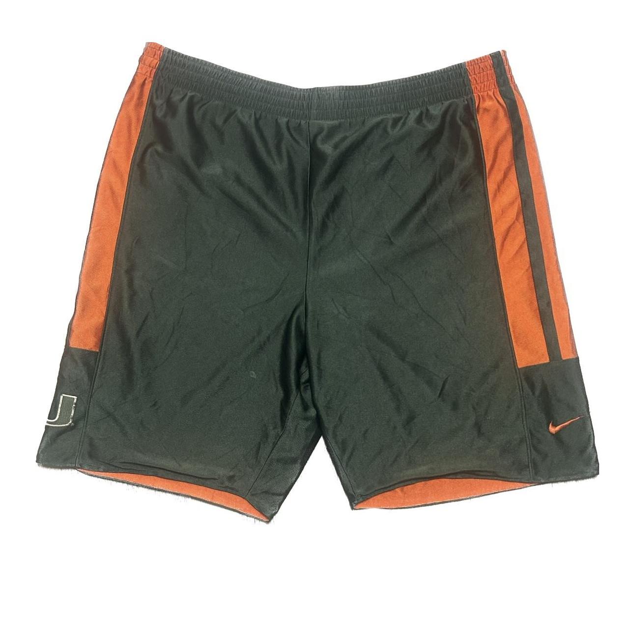 Green and 2025 orange nike shorts