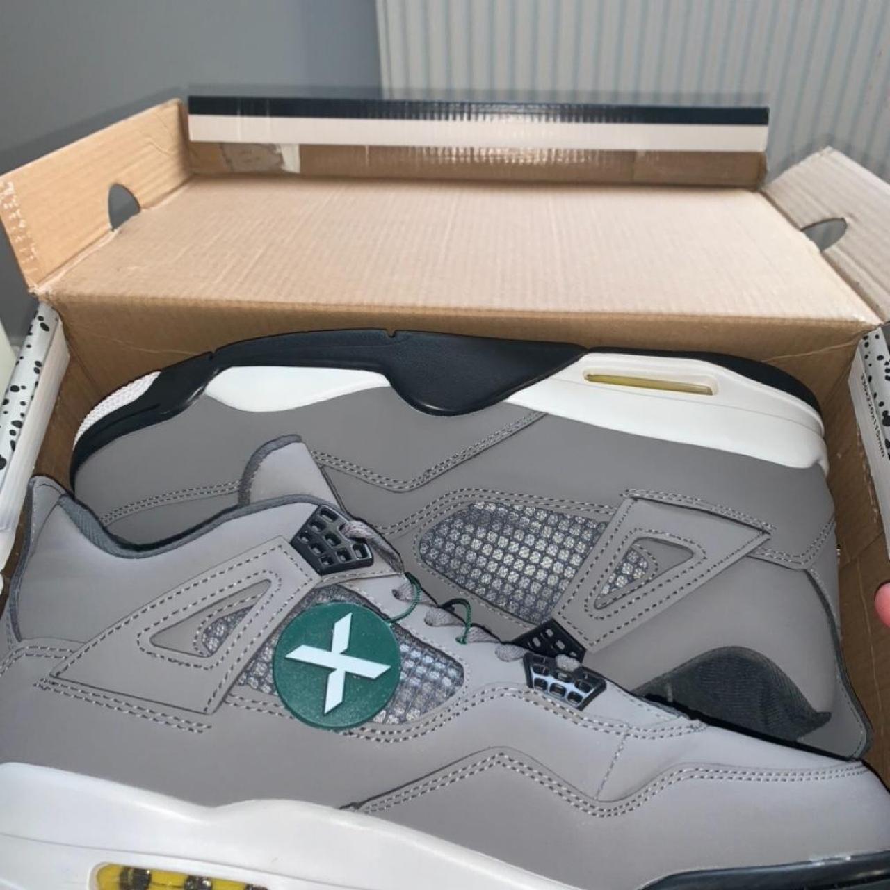 grey jordan 4's