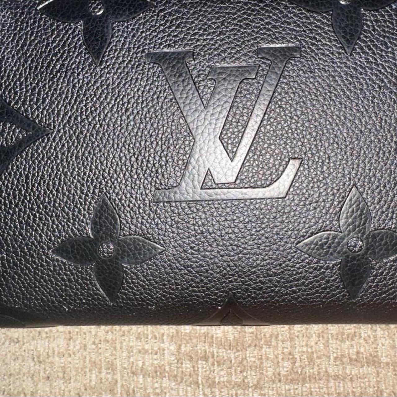 M80680 Louis Vuitton Wild at Heart Zippy Wallet