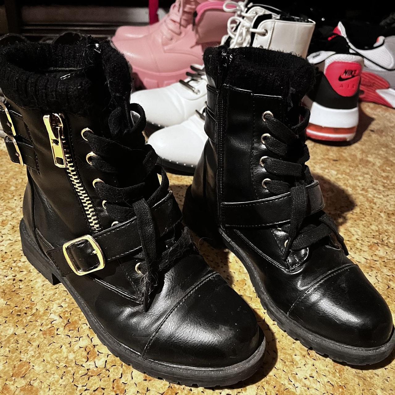 black boots with gold detail
