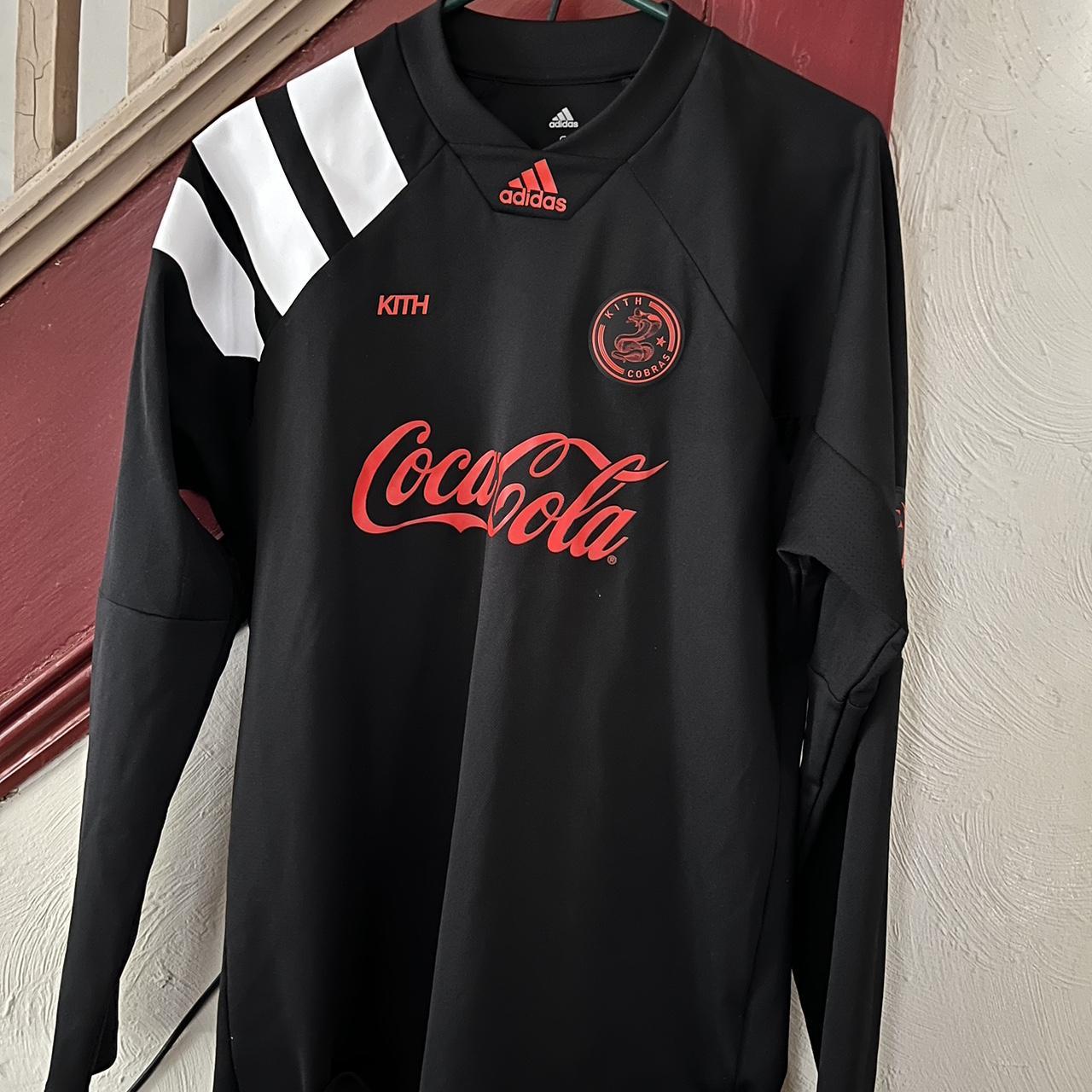 Kith cobras x Coca-Cola Adidas black soccer jersey.