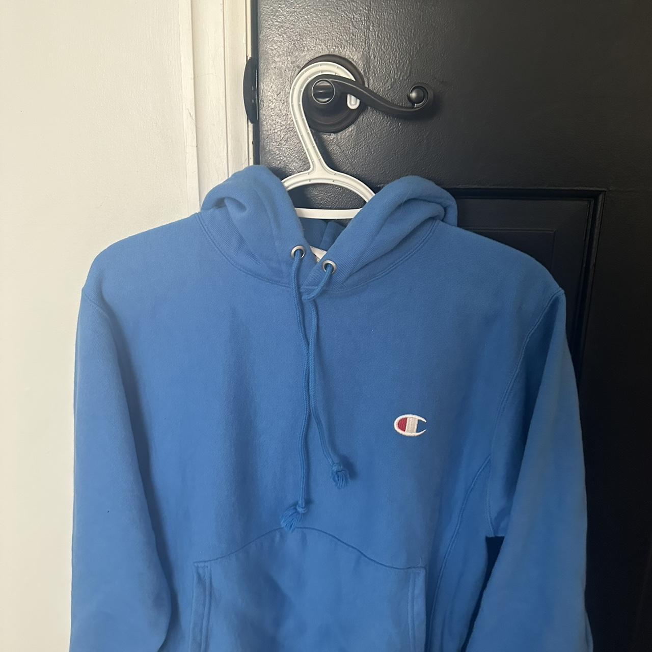 Blue champion hoodie Women’s Small - Depop