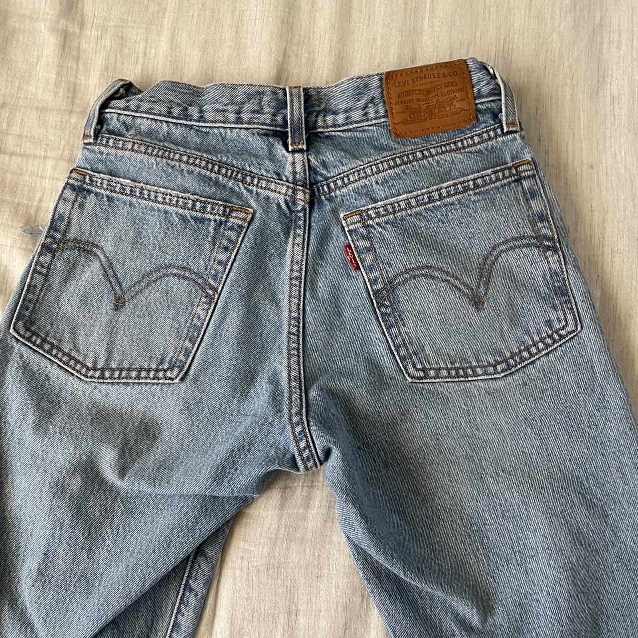 medium wash ripped levi jeans straight fit - Depop