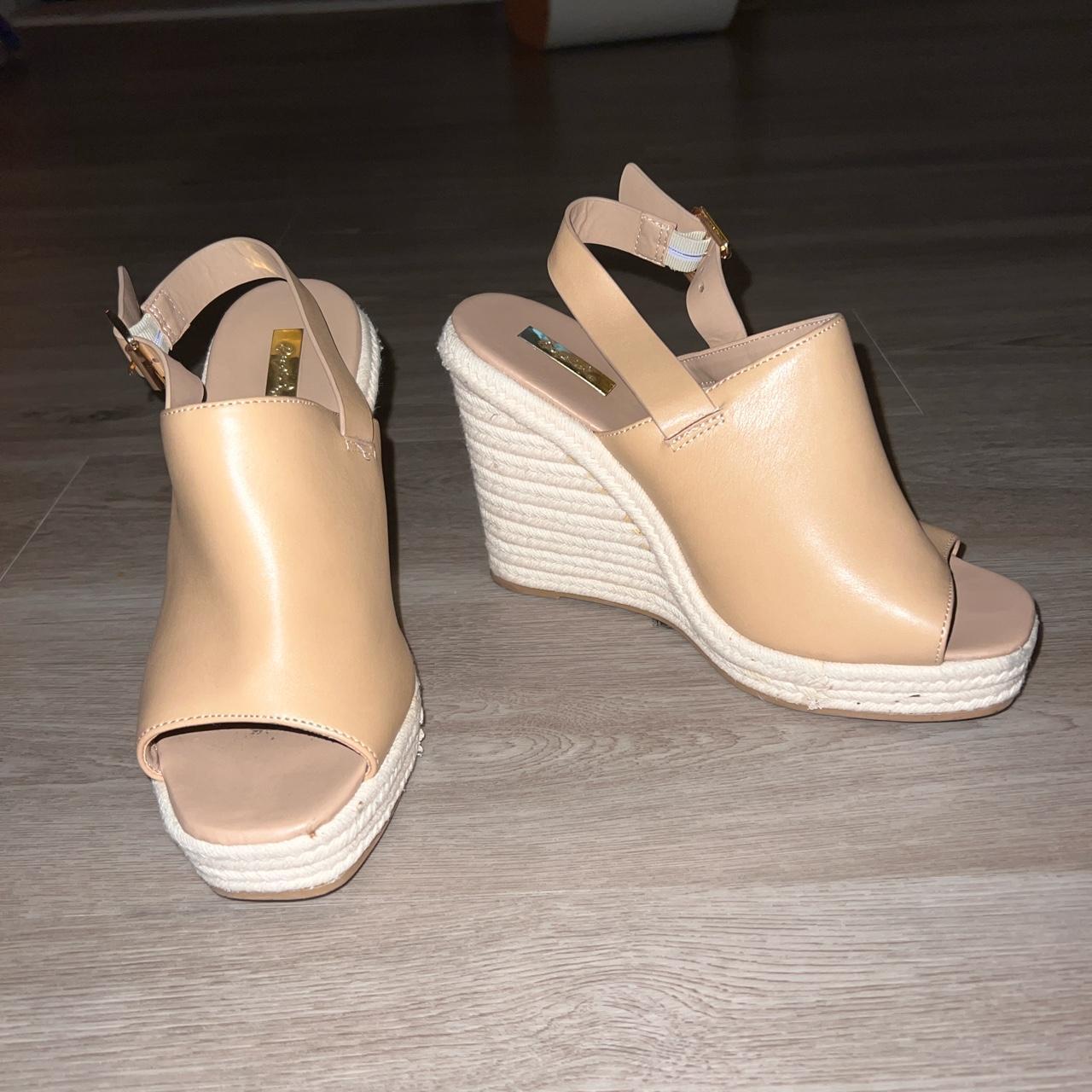 Neutral nude wedge sandals in great condition. Depop