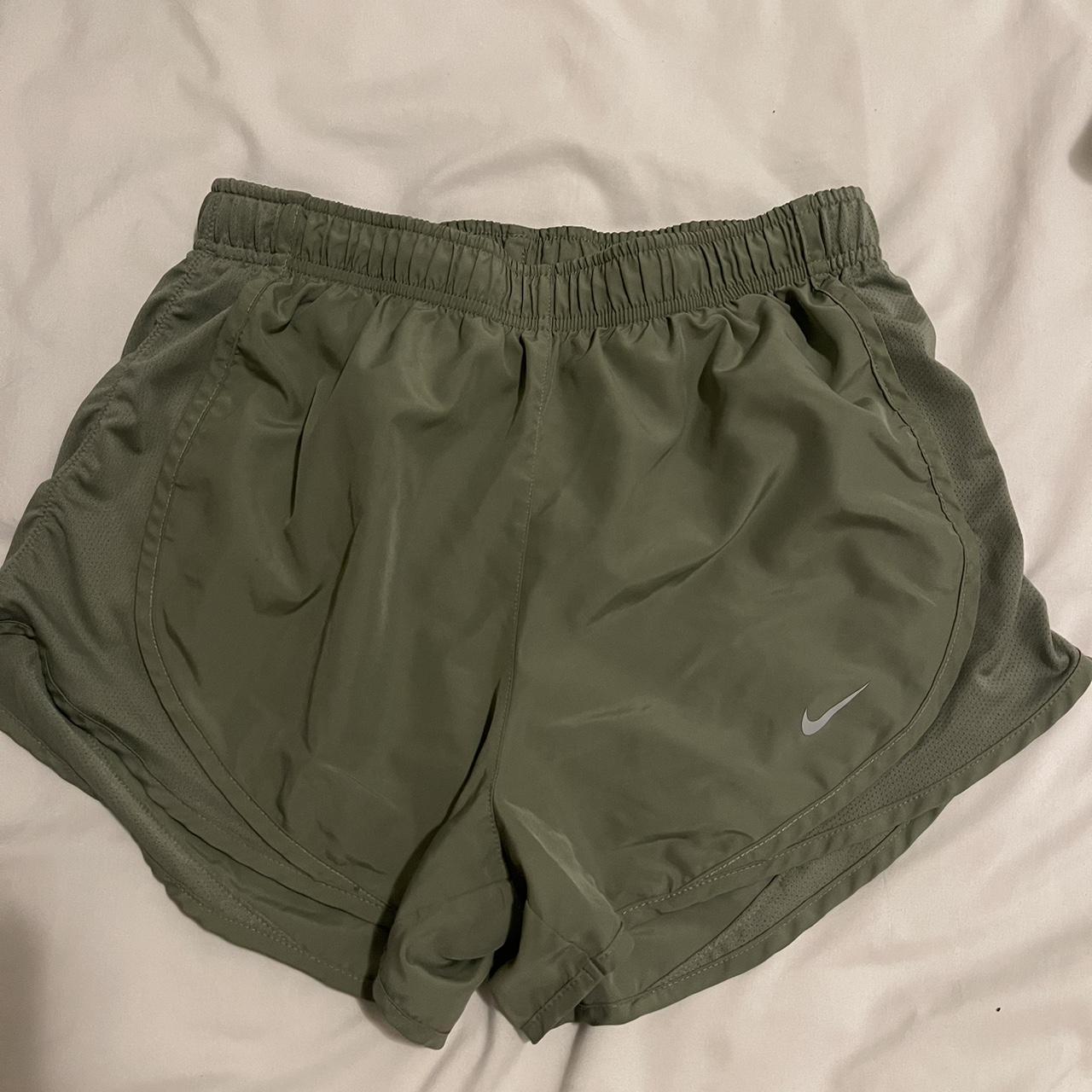 Green Nike running shorts - Depop