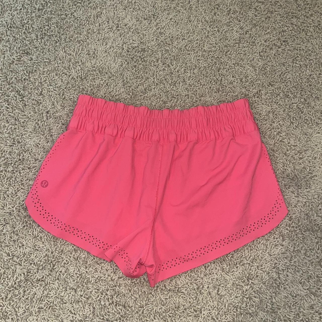 size 4 neon pink lululemon shorts with cutouts and... - Depop