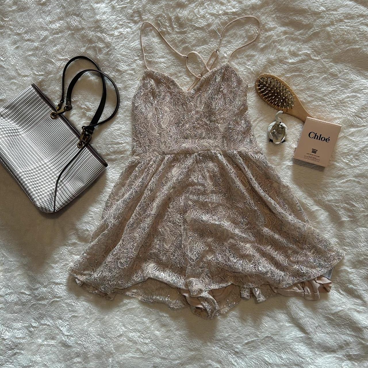 this cute lil kimchi blue romper! its sparkly with... Depop