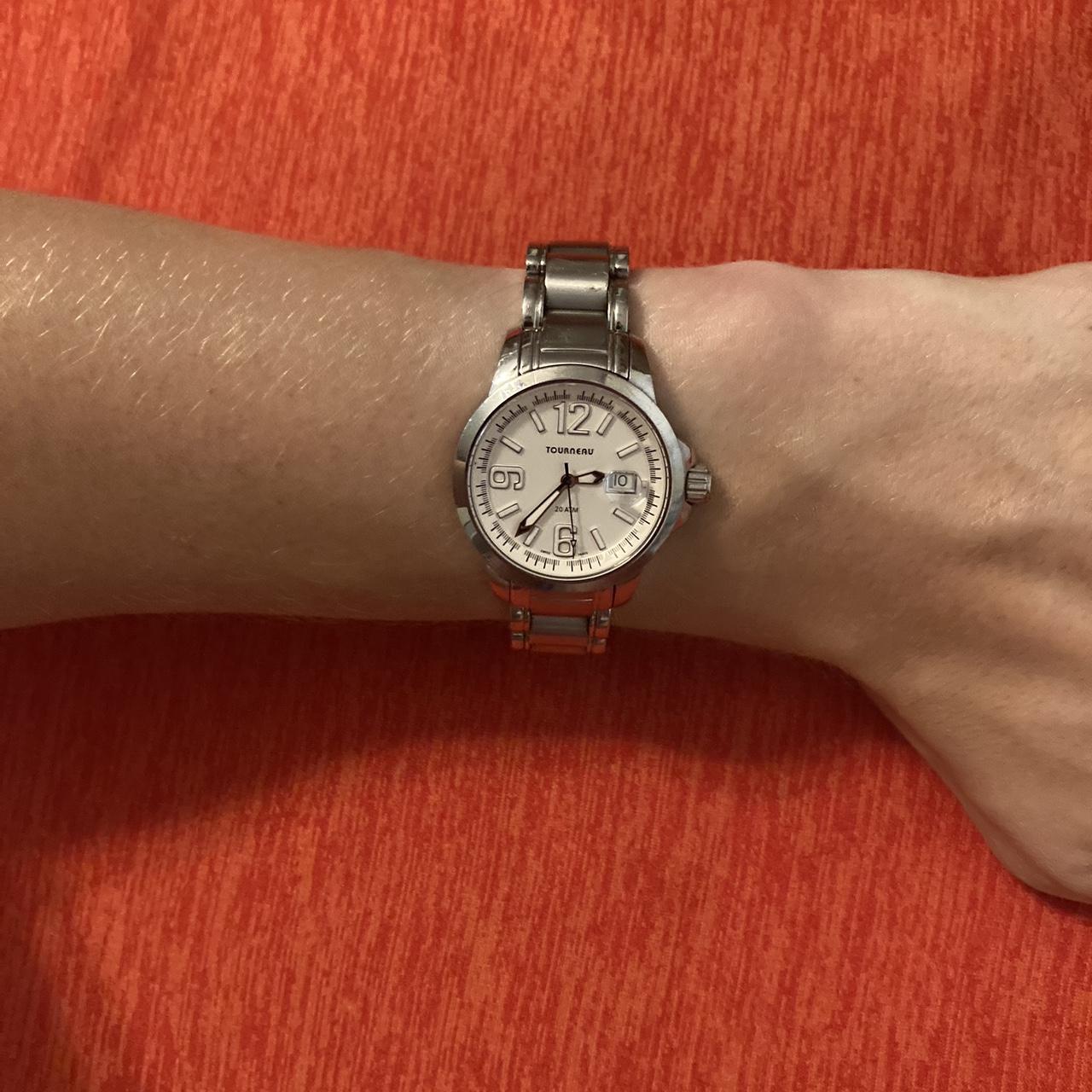 This is a woman's solid stainless steel Swiss Depop