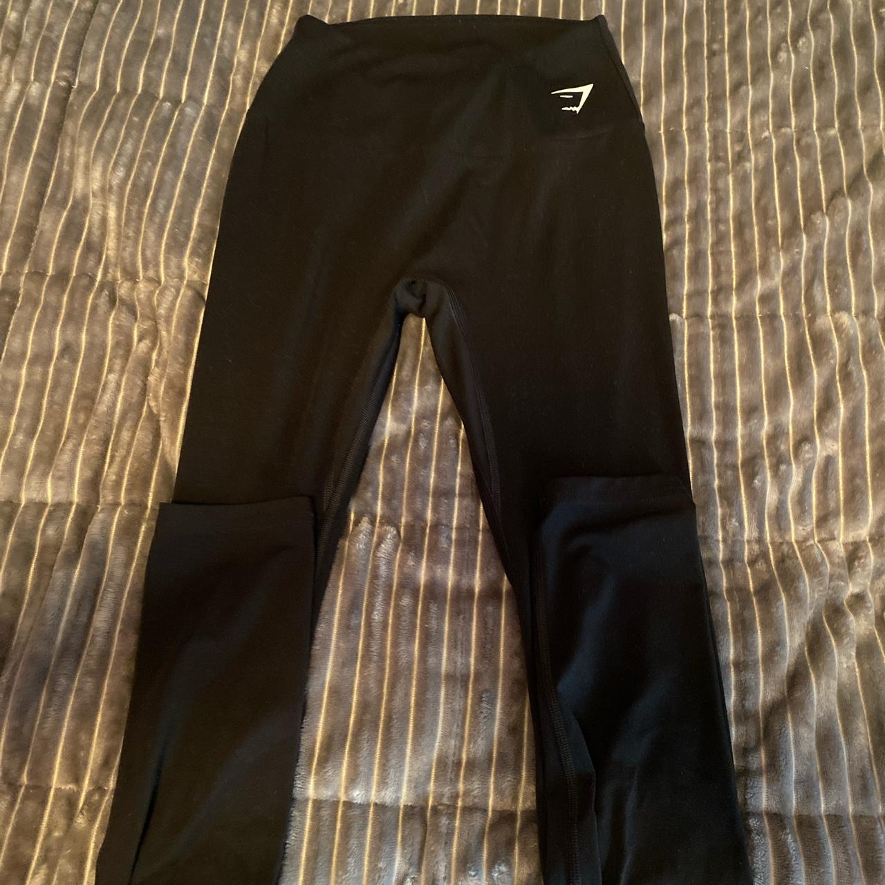 black gymshark leggings scratches on the butt shown - Depop