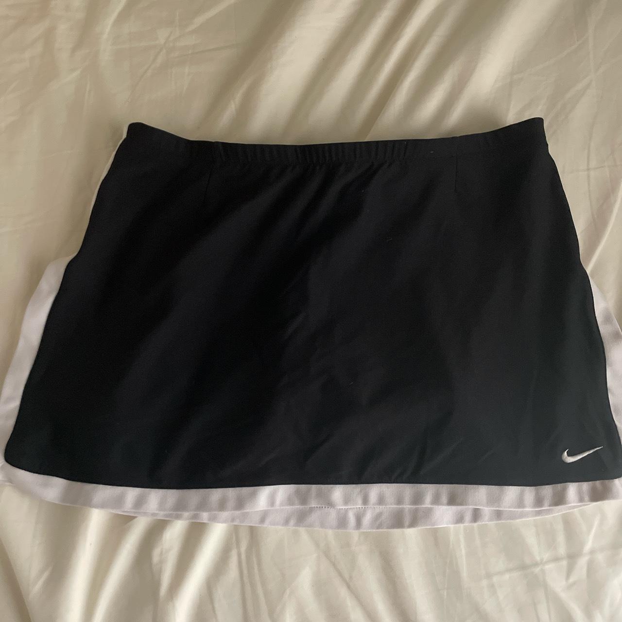 Vintage nike tennis skirt black with white stripes... Depop
