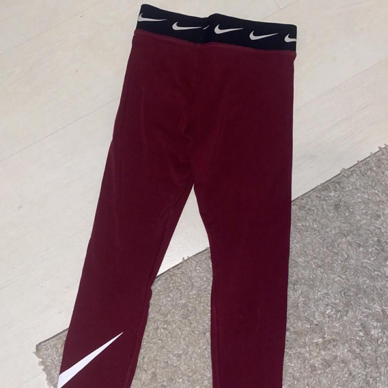 Shiny maroon nike leggings size small - Depop