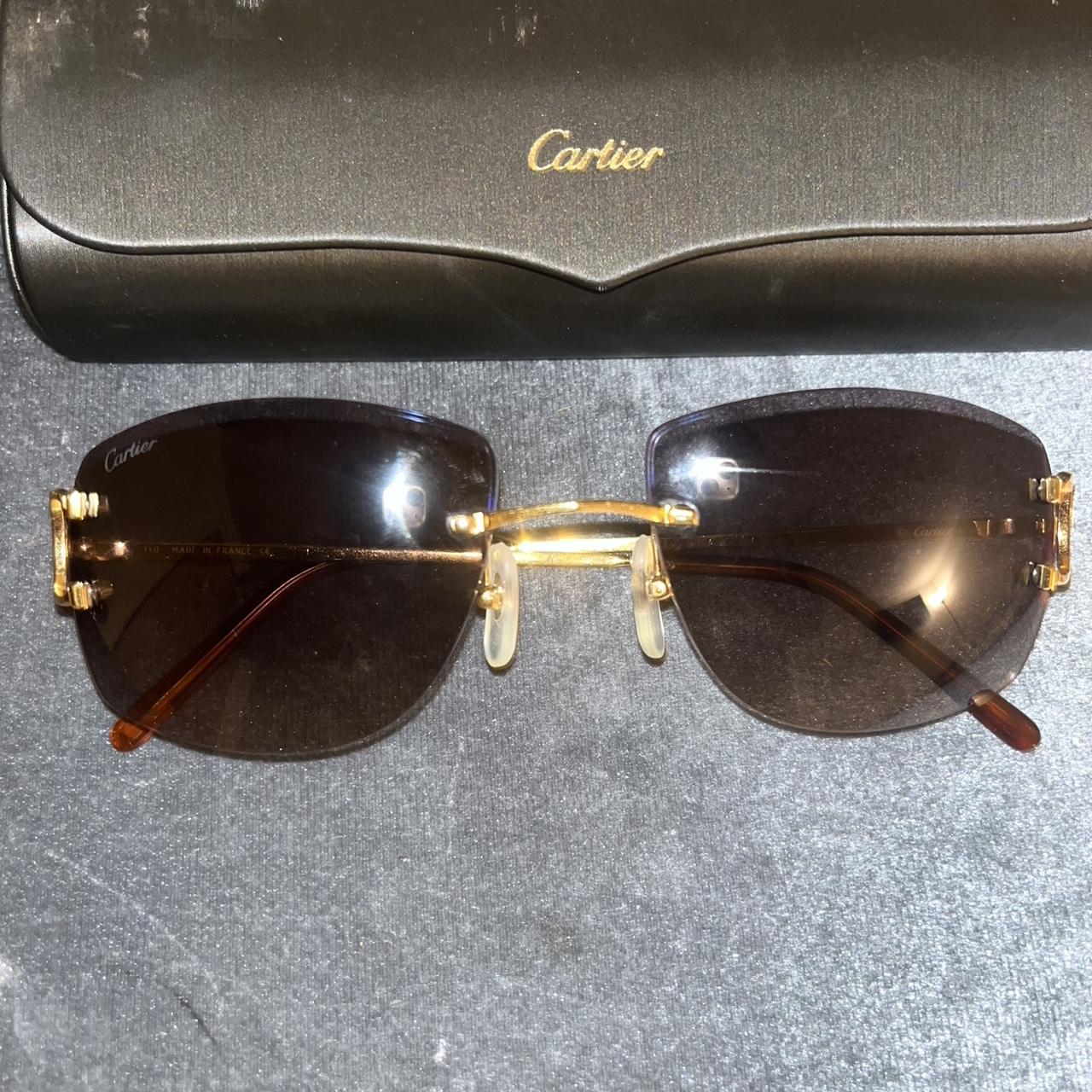 Cartier glasses dark tint C decor