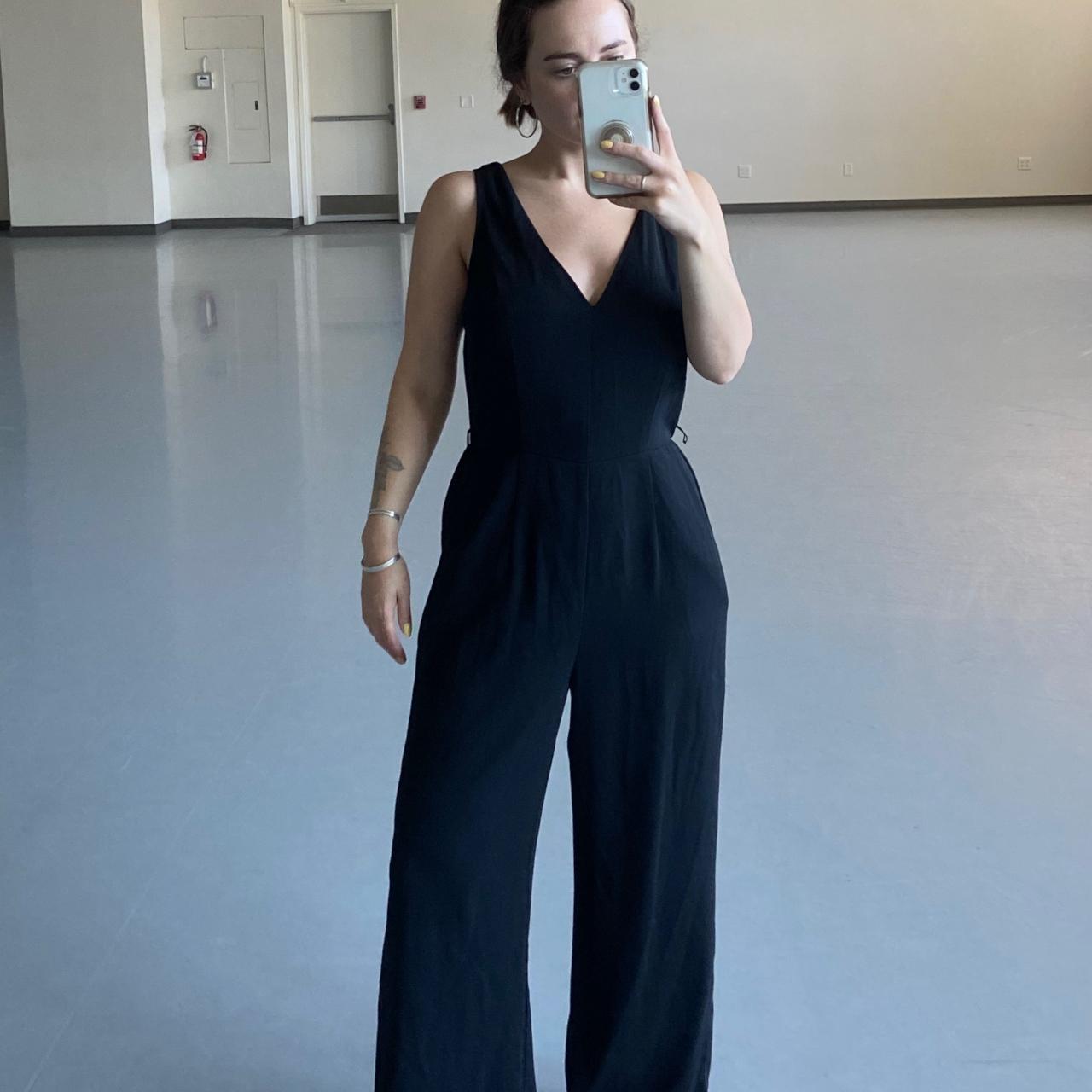 a new day size s black tank jumpsuit. synthetic... - Depop