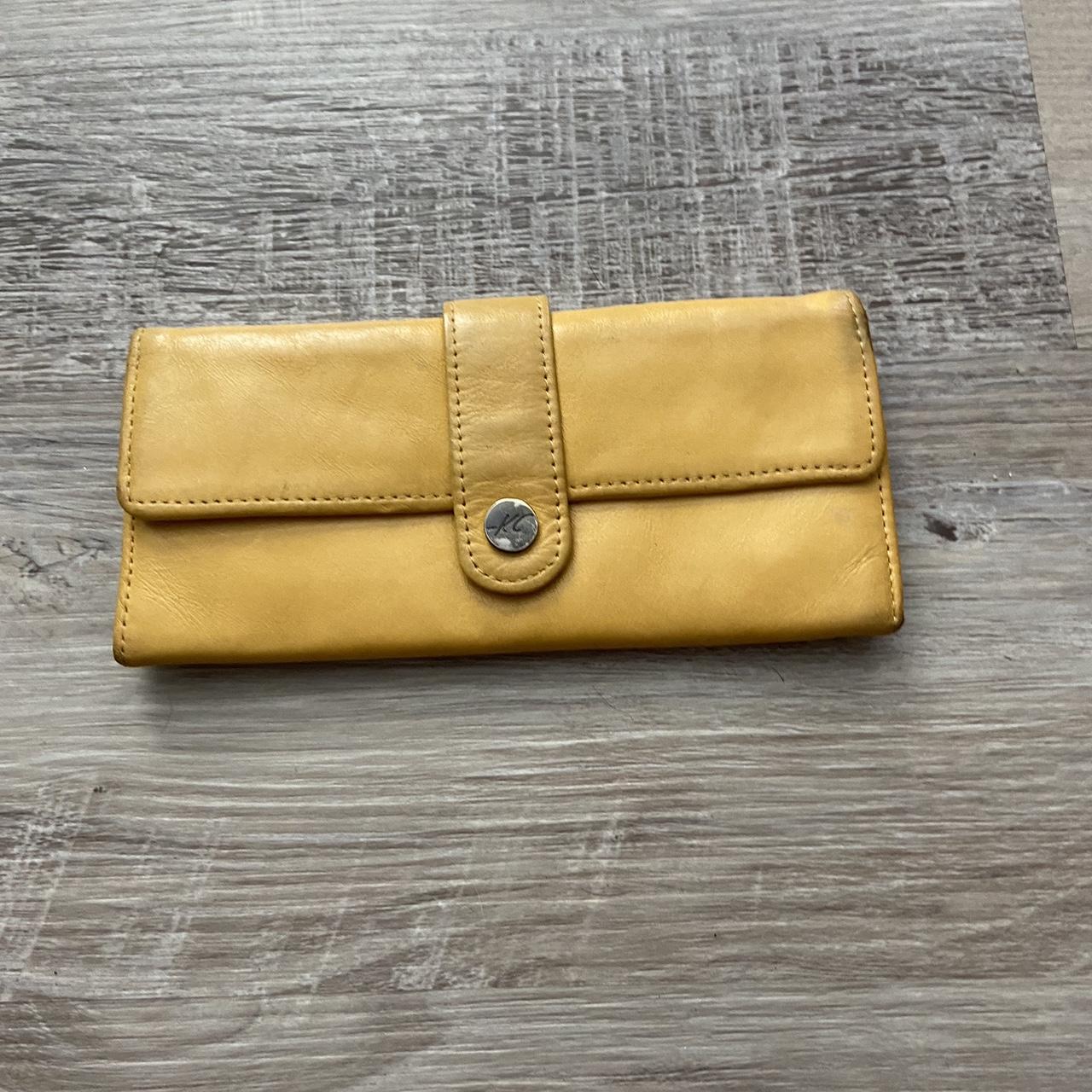 Mustard yellow wallet with paisley pattern on the... Depop