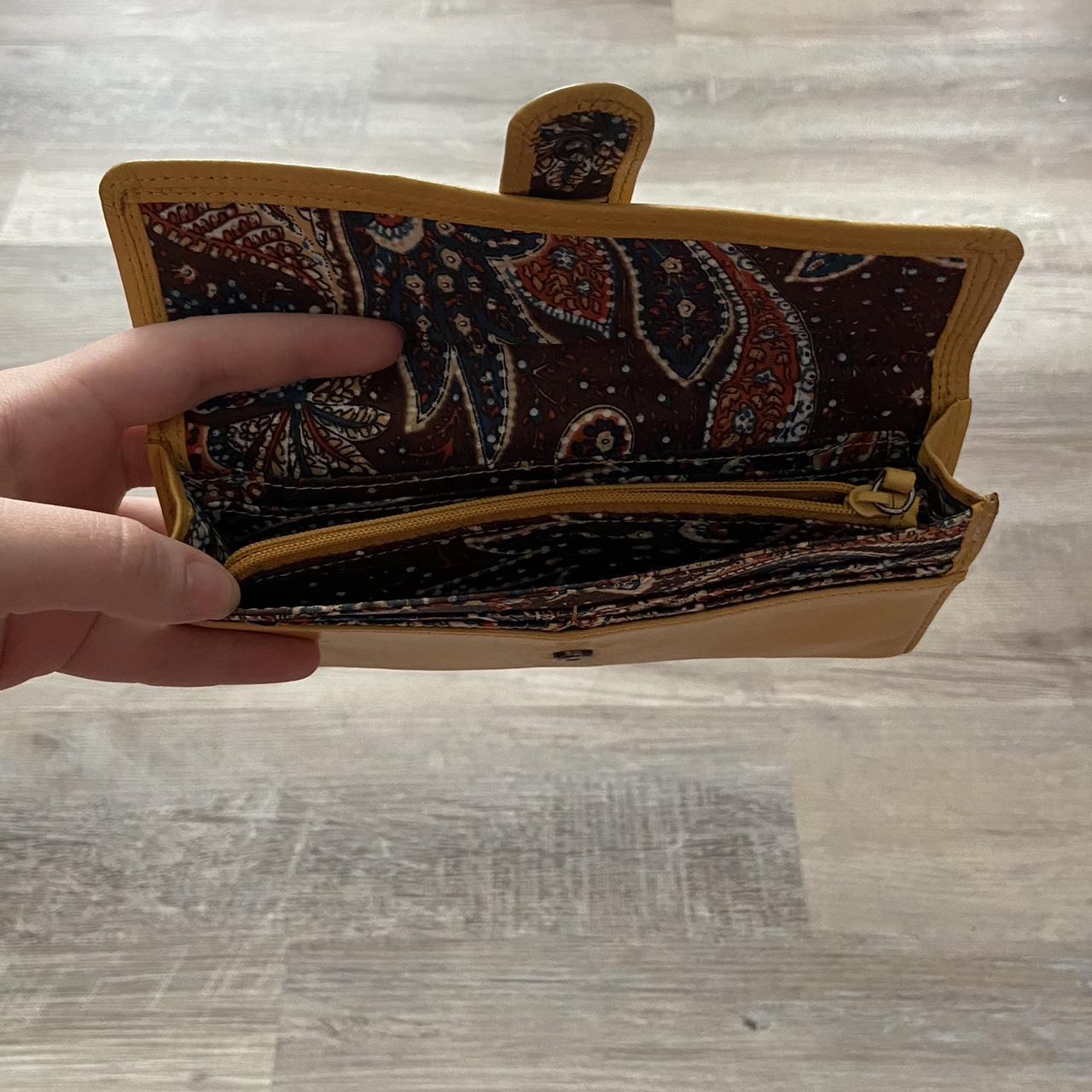 Mustard yellow wallet with paisley pattern on the... Depop