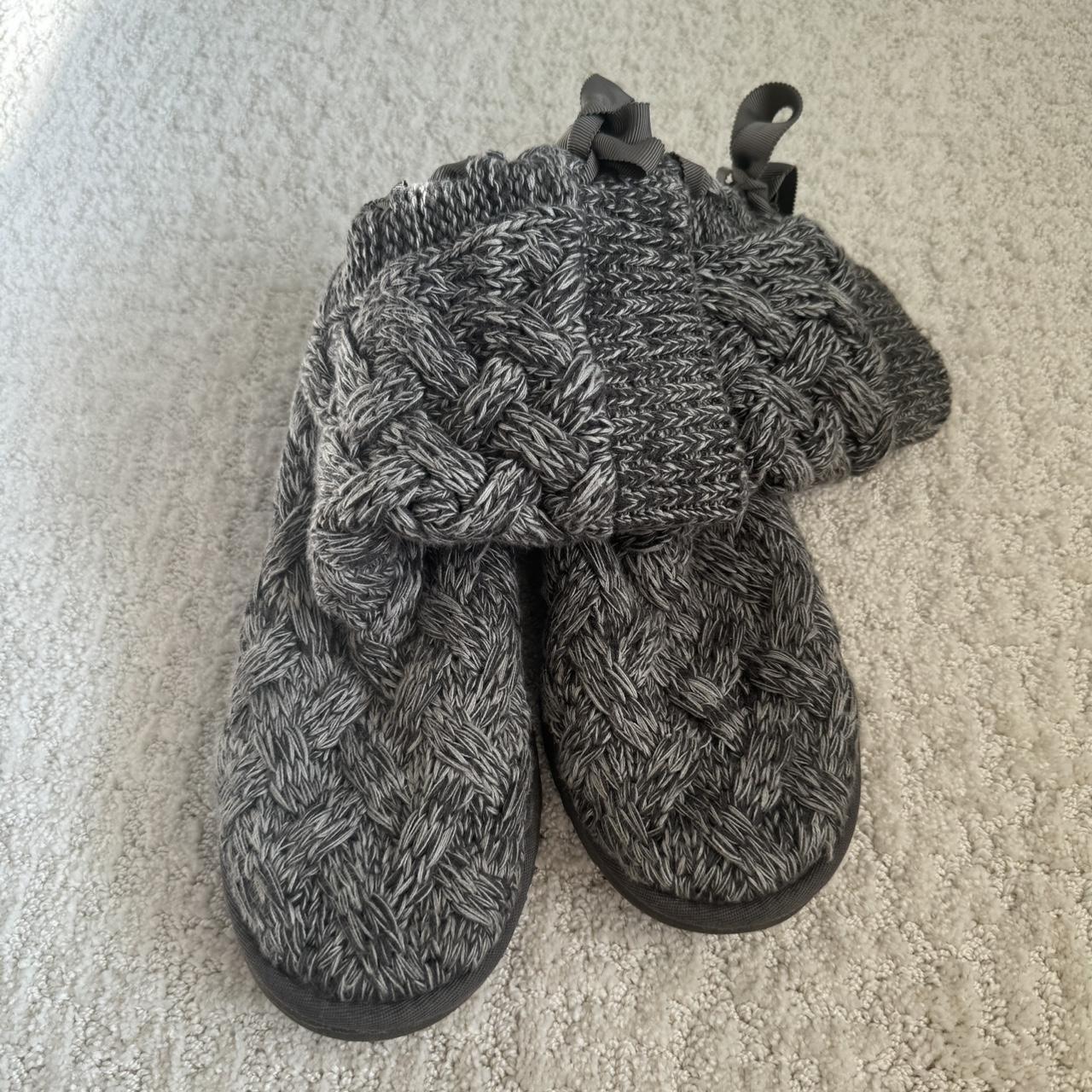 Grey knit Uggs with a lace up bow on the back of the. Depop