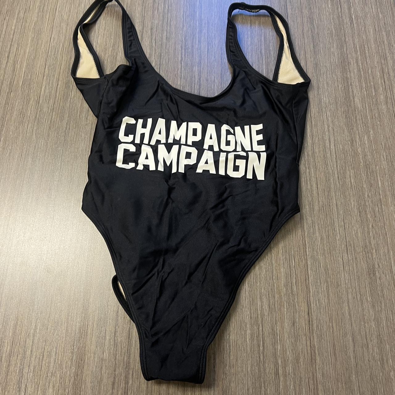 Champagne shops campaign swimsuit