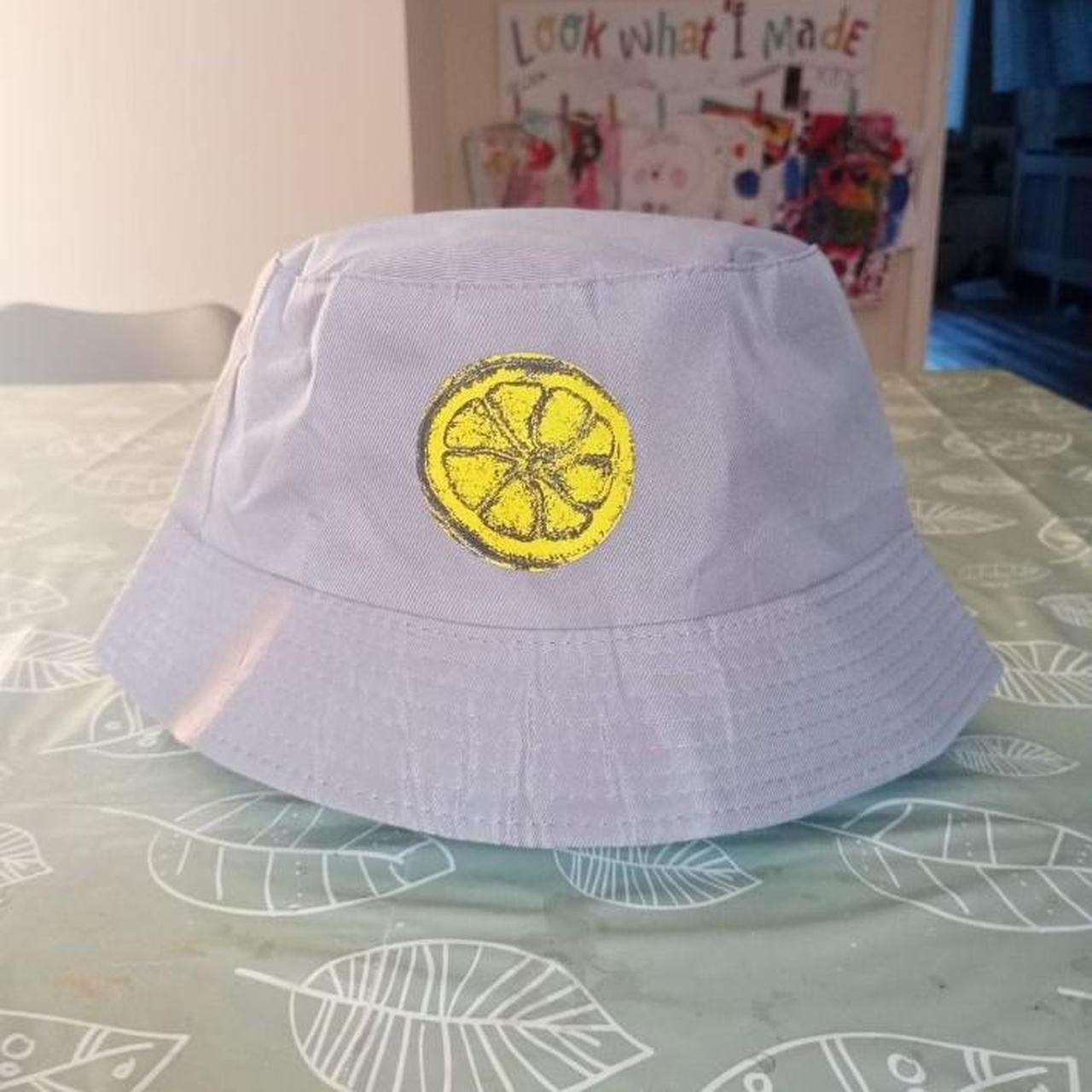 Light grey stone roses bucket hat. One size. Brand