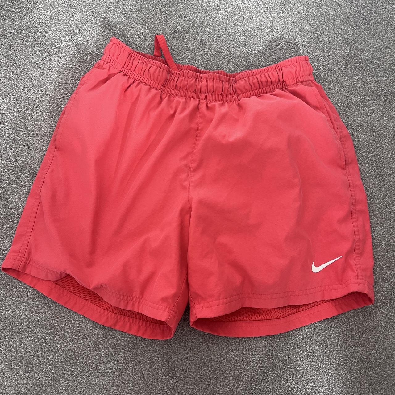 Men’s pink medium Nike swimming shorts - Depop