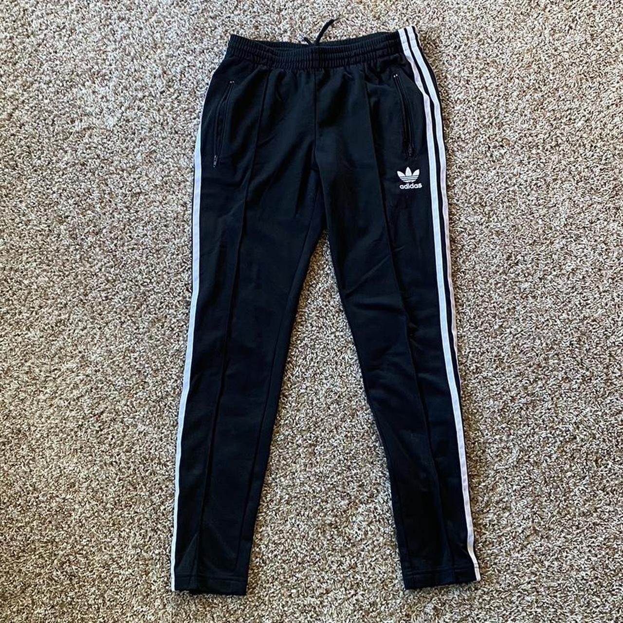 Adidas black striped track pant, zippers on ankles,... Depop