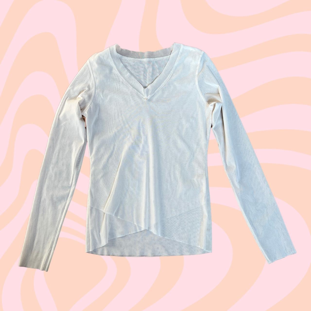 Elegant cream sheet mesh vneck top from 1990s with... Depop