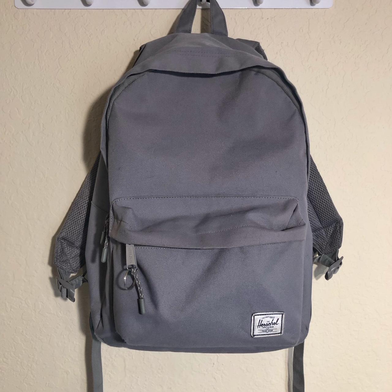 grey Herschel backpack, slightly used some small... - Depop